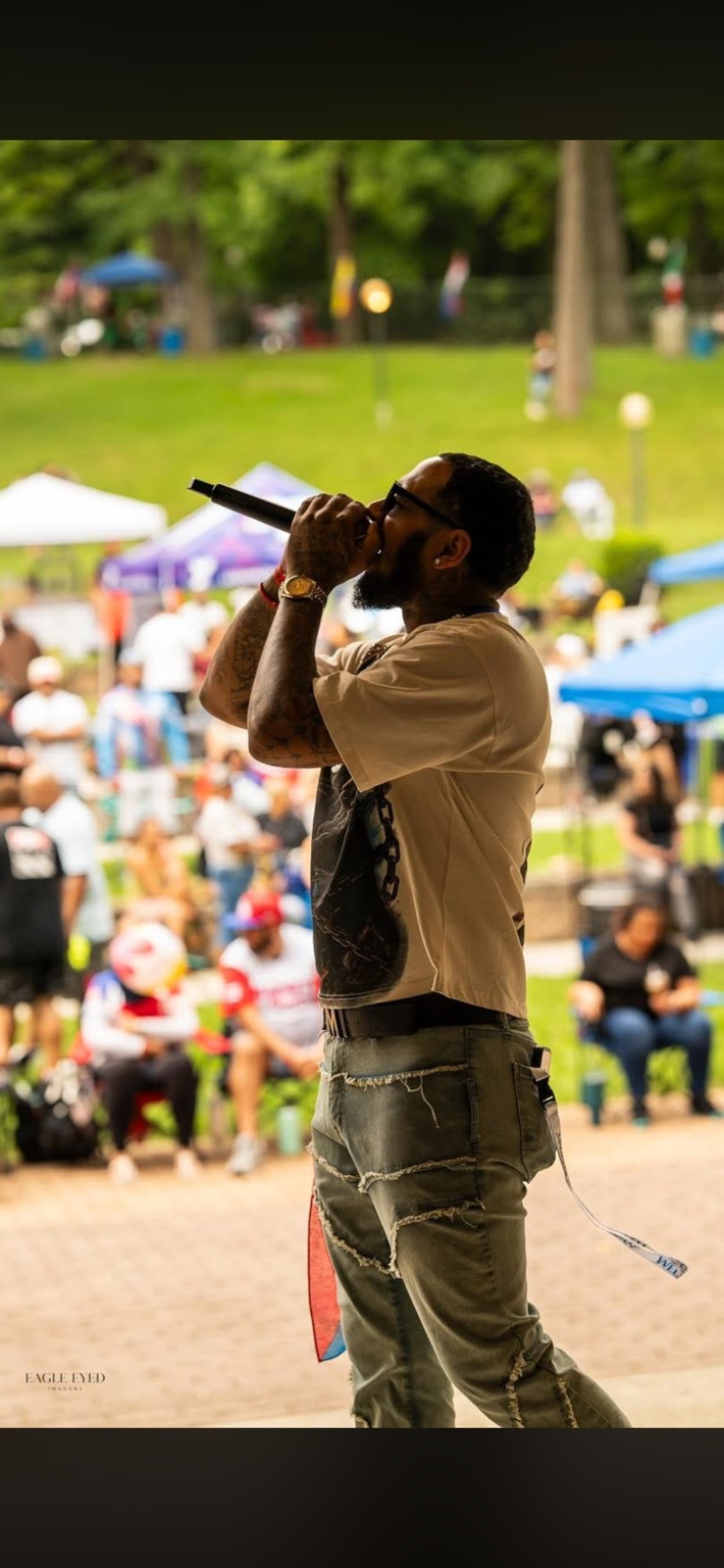 BF Kino performing outdoors with a microphone